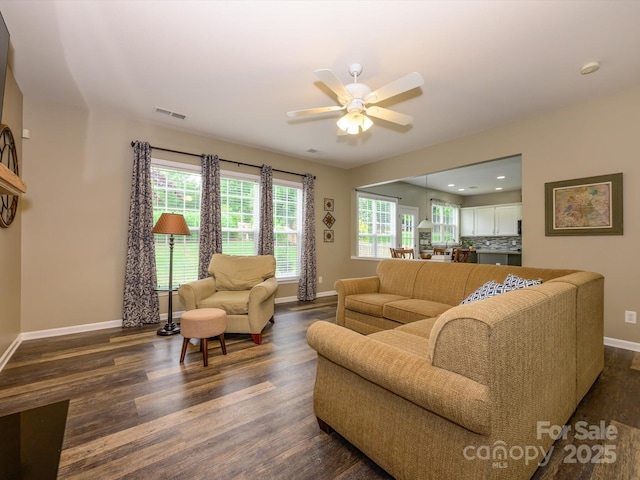 3224 Dunbar Ln, Fort Mill, SC 29707 - living area featuring baseboards, dark wood-type flooring, and a ceiling fan