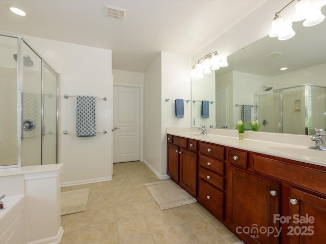 3224 Dunbar Ln, Fort Mill, SC 29707 - full bath featuring a shower stall, tile patterned flooring, double vanity, baseboards, and a bath