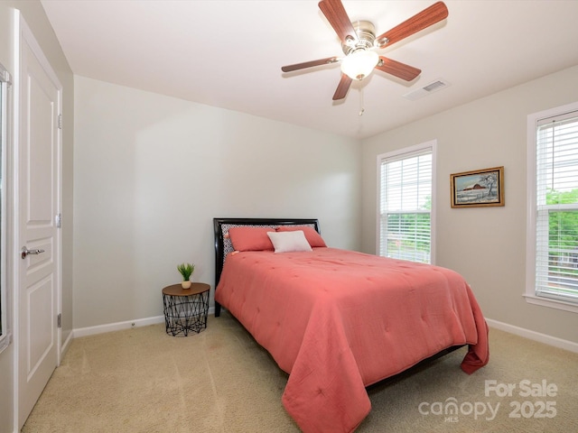 3224 Dunbar Ln, Fort Mill, SC 29707 - carpeted bedroom featuring baseboards, multiple windows, and ceiling fan