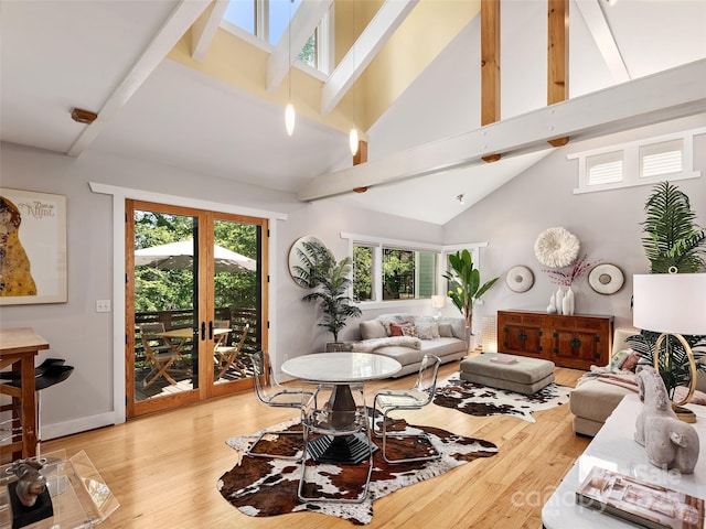 11 Kenilworth Rd, Asheville, NC 28803 - living area with high vaulted ceiling, hardwood / wood-style flooring, and beamed ceiling