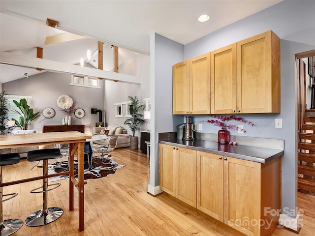 11 Kenilworth Rd, Asheville, NC 28803 - kitchen featuring stainless steel countertops, light wood-type flooring, light brown cabinetry, open floor plan, and recessed lighting