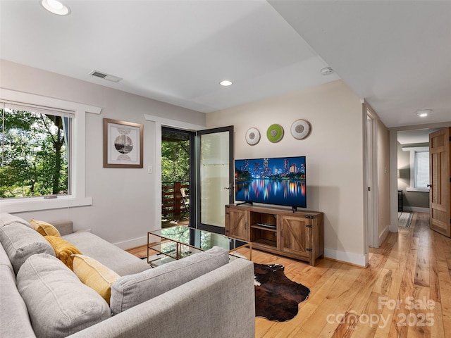 11 Kenilworth Rd, Asheville, NC 28803 - living room with light wood finished floors, baseboards, and recessed lighting