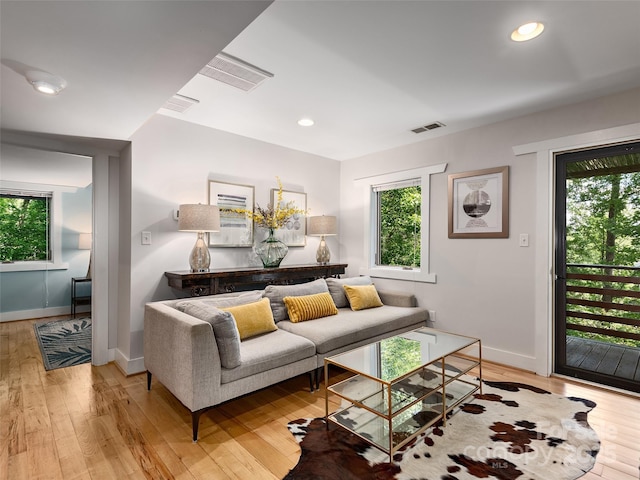 11 Kenilworth Rd, Asheville, NC 28803 - living room featuring light wood-style floors, baseboards, and recessed lighting