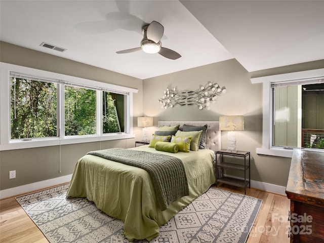 11 Kenilworth Rd, Asheville, NC 28803 - bedroom with baseboards, wood finished floors, and a ceiling fan
