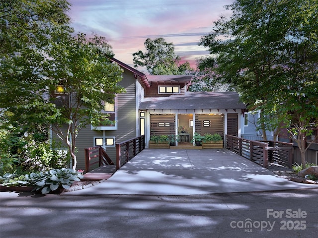 11 Kenilworth Rd, Asheville, NC 28803 - view of front of home with covered porch and roof with shingles