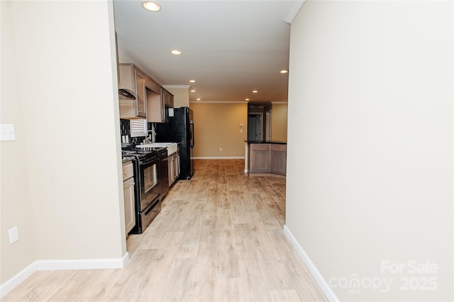 3499 Fairview Rd, Nebo, NC 28761 - kitchen featuring electric range, baseboards, recessed lighting, light wood-style flooring, and backsplash