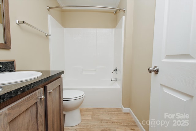 3499 Fairview Rd, Nebo, NC 28761 - bathroom featuring wood finished floors, toilet, vanity, and shower / bathtub combination