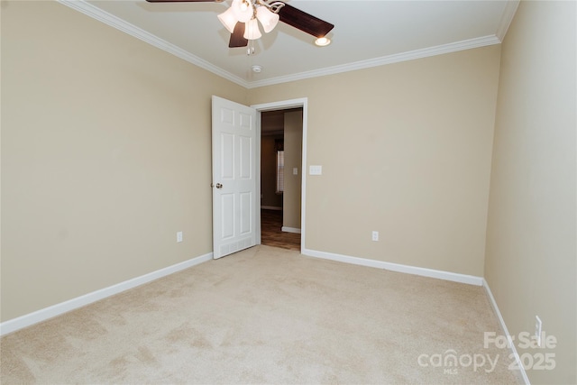 3499 Fairview Rd, Nebo, NC 28761 - empty room featuring ornamental molding, light colored carpet, ceiling fan, and baseboards