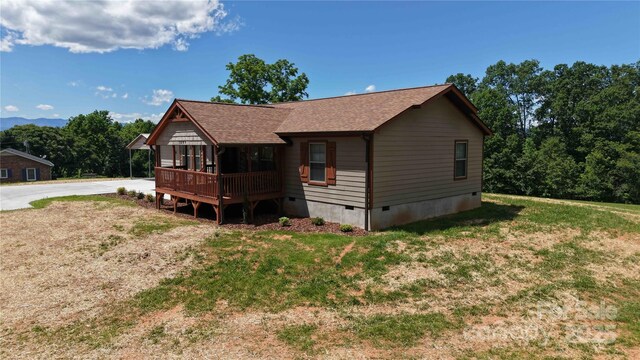 3499 Fairview Rd, Nebo, NC 28761 - view of front of property featuring crawl space, a front lawn, roof with shingles, and driveway