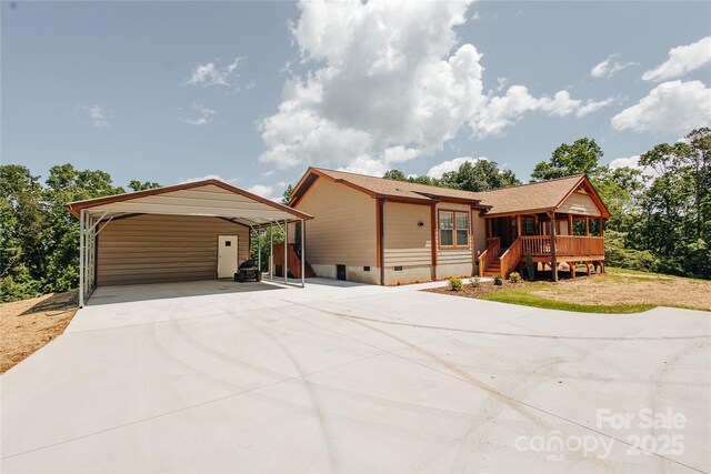 3499 Fairview Rd, Nebo, NC 28761 - view of front of house with driveway, crawl space, and a detached carport