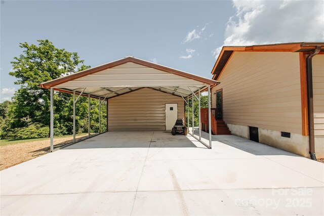 3499 Fairview Rd, Nebo, NC 28761 - view of parking / parking lot featuring a detached carport and driveway