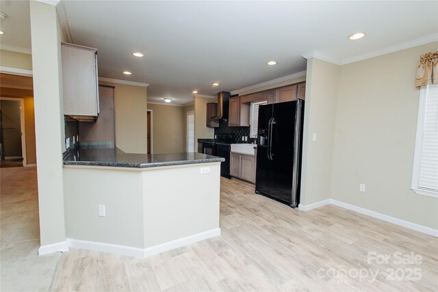 3499 Fairview Rd, Nebo, NC 28761 - kitchen with black refrigerator with ice dispenser, backsplash, crown molding, dark countertops, and recessed lighting
