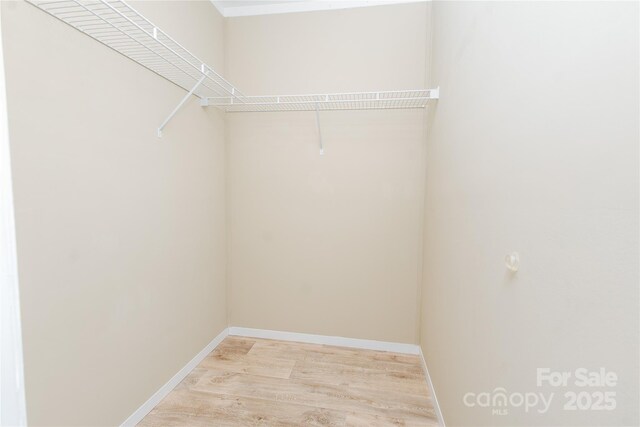 3499 Fairview Rd, Nebo, NC 28761 - spacious closet with light wood-style flooring