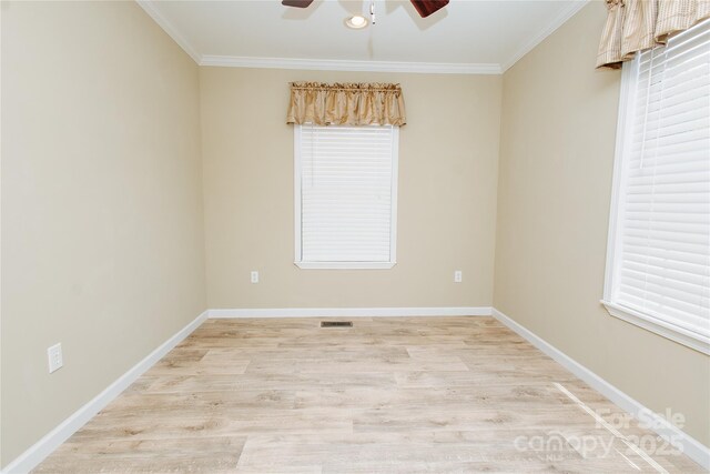 3499 Fairview Rd, Nebo, NC 28761 - spare room featuring a ceiling fan, ornamental molding, light wood-style flooring, and baseboards