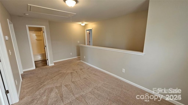 5823 Natick Dr, Charlotte, NC 28214 - empty room featuring attic access, carpet flooring, and baseboards