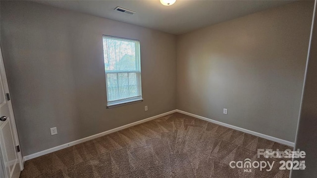 5823 Natick Dr, Charlotte, NC 28214 - empty room featuring carpet floors and baseboards