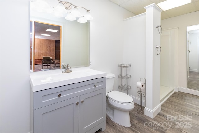 109 Wilkie Way, Fletcher, NC 28732 - full bathroom featuring wood finished floors, toilet, walk in shower, vanity, and baseboards