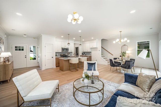 4547 Kings Ct, Hickory, NC 28602 - living area with a chandelier, stairs, recessed lighting, light wood finished floors, and crown molding