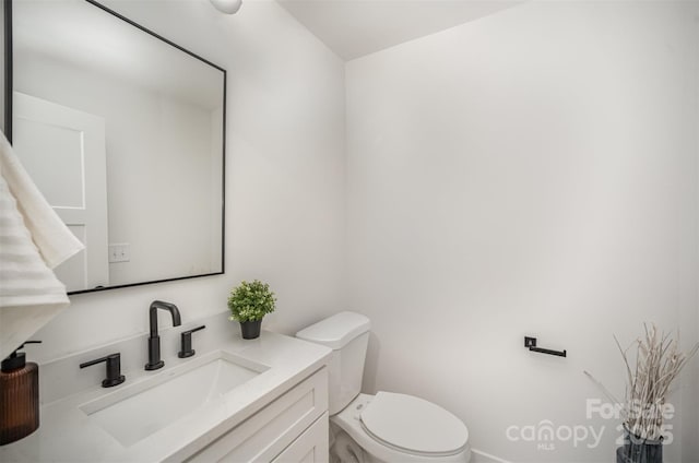 4547 Kings Ct, Hickory, NC 28602 - bathroom featuring toilet and vanity