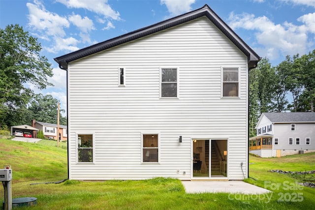 4547 Kings Ct, Hickory, NC 28602 - back of house with a yard and a patio area