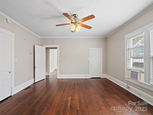 spare room featuring dark wood-style floors, ceiling fan, ornamental molding, cooling unit, and baseboards