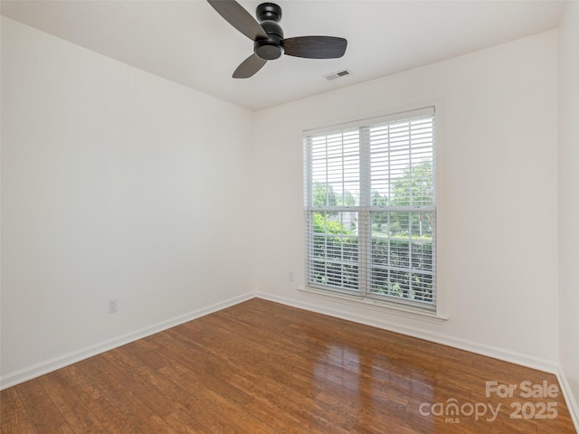 14 Stonehollow Rd, Fletcher, NC 28732 - spare room with wood finished floors, baseboards, and a ceiling fan