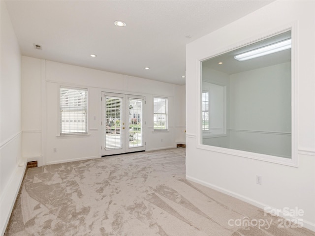 14 Stonehollow Rd, Fletcher, NC 28732 - spare room with french doors, carpet, recessed lighting, and baseboards