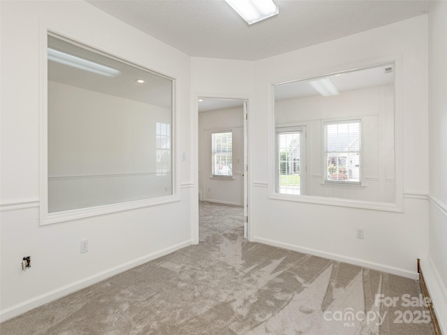14 Stonehollow Rd, Fletcher, NC 28732 - spare room featuring carpet floors and baseboards