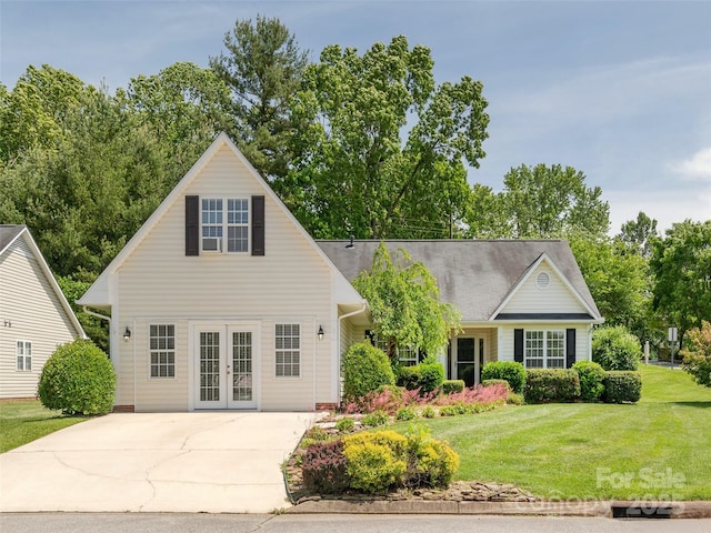 14 Stonehollow Rd, Fletcher, NC 28732 - view of front of home featuring french doors, a front yard, and concrete driveway