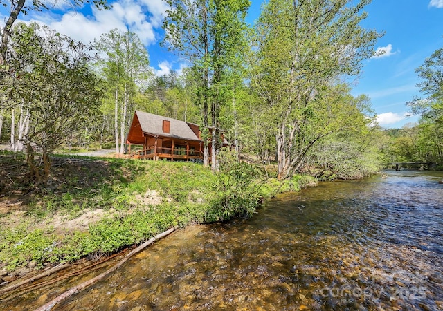 91 Riverview Dr, Robbinsville, NC 28771 - view of yard featuring a forest view