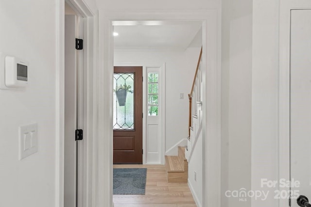5910 Grosner Pl, Charlotte, NC 28211 - entrance foyer with light wood finished floors, stairway, and baseboards