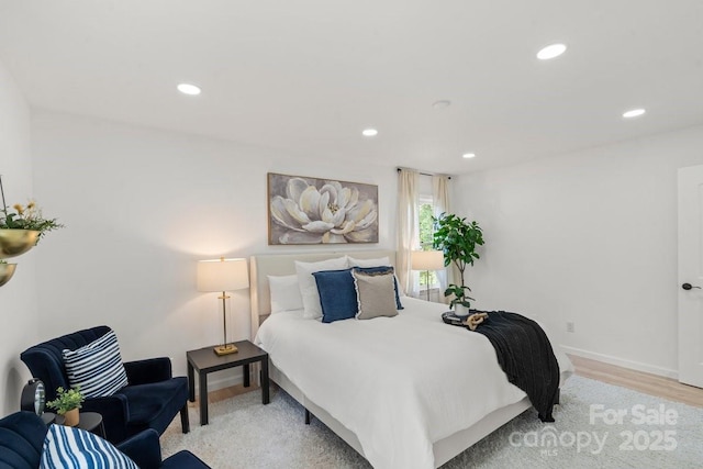5910 Grosner Pl, Charlotte, NC 28211 - bedroom featuring light wood-type flooring, recessed lighting, and baseboards