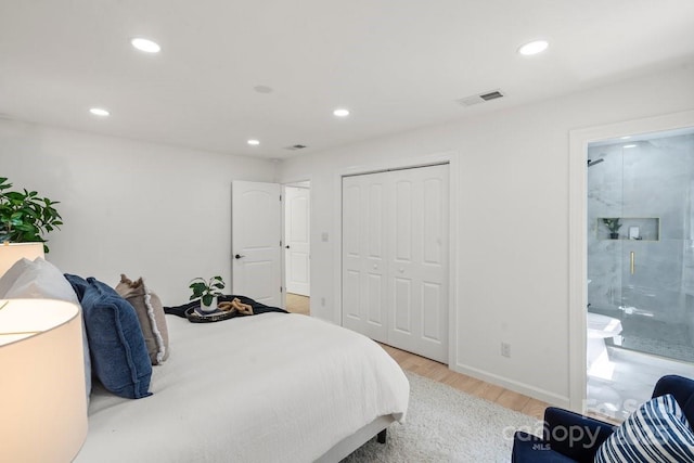 5910 Grosner Pl, Charlotte, NC 28211 - bedroom featuring wood finished floors, recessed lighting, a closet, ensuite bathroom, and baseboards