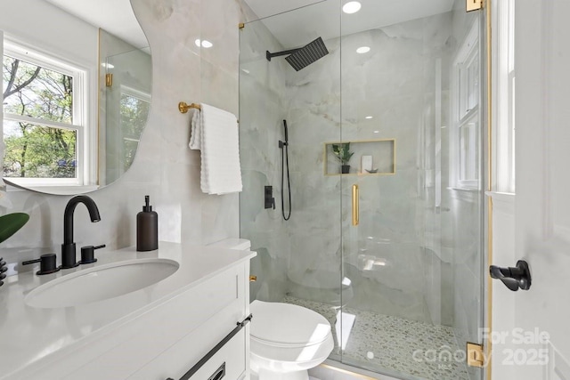 5910 Grosner Pl, Charlotte, NC 28211 - bathroom featuring a marble finish shower, toilet, and vanity