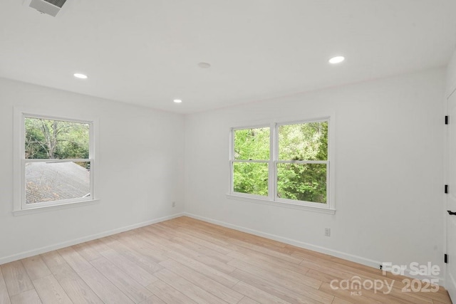 5910 Grosner Pl, Charlotte, NC 28211 - unfurnished room with plenty of natural light, light wood-style flooring, baseboards, and recessed lighting