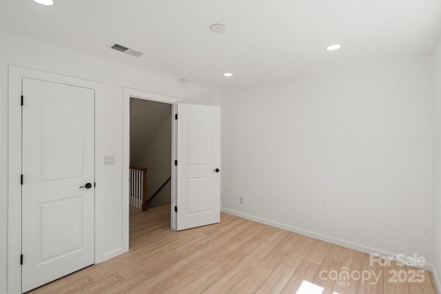 5910 Grosner Pl, Charlotte, NC 28211 - unfurnished bedroom featuring light wood-type flooring, recessed lighting, and baseboards