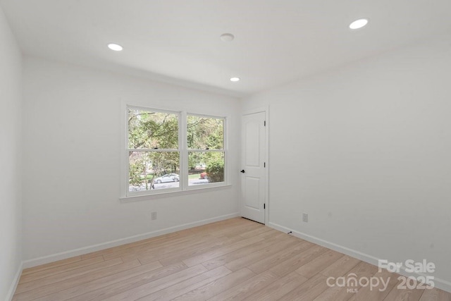 5910 Grosner Pl, Charlotte, NC 28211 - unfurnished room featuring light wood-style floors, recessed lighting, and baseboards