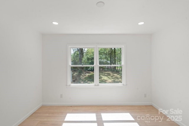 5910 Grosner Pl, Charlotte, NC 28211 - unfurnished room with light wood finished floors, recessed lighting, and baseboards