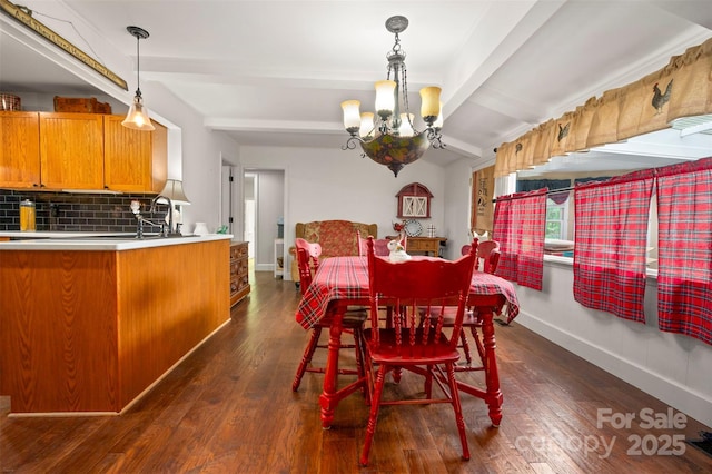 64 Persimmon Hill Dr Unit 4, Columbus, NC 28722 - dining space with a chandelier, beamed ceiling, dark wood-type flooring, and baseboards