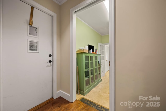 64 Persimmon Hill Dr Unit 4, Columbus, NC 28722 - doorway to outside with crown molding, baseboards, and wood finished floors
