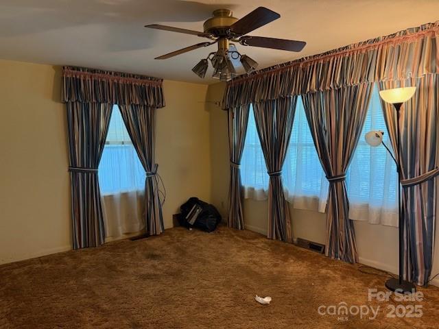 2165 Mccraw Rd, Mooresboro, NC 28114 - carpeted spare room with a ceiling fan