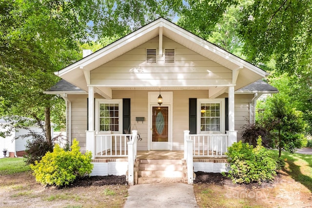 204 S Elm St, Cherryville, NC 28021 - bungalow-style home with covered porch and a shingled roof