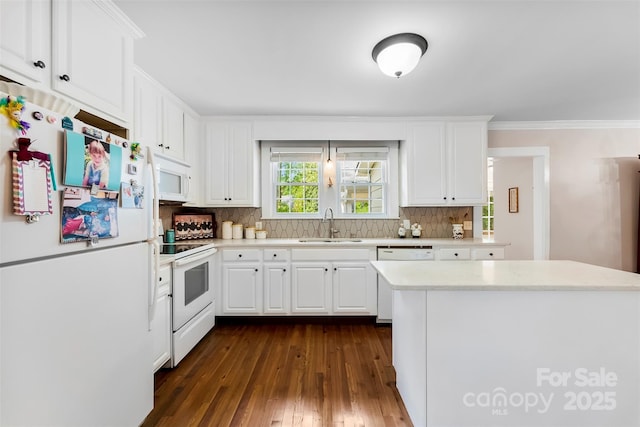 204 S Elm St, Cherryville, NC 28021 - kitchen featuring white appliances, a sink, light countertops, dark wood finished floors, and tasteful backsplash