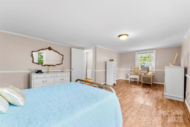 204 S Elm St, Cherryville, NC 28021 - bedroom featuring light wood-style floors, baseboards, and ornamental molding