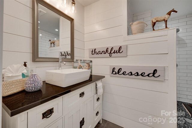 3091 Old Meeting House Rd, Sharon, SC 29742 - full bath featuring vanity, a walk in shower, and wood walls