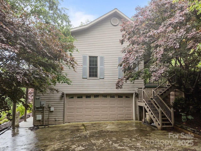 273 Bluebird Rd, Lake Lure, NC 28746 - view of front of property with stairs, a garage, and driveway