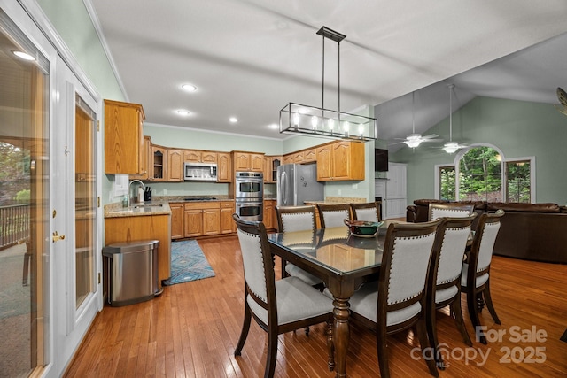 273 Bluebird Rd, Lake Lure, NC 28746 - dining area with light wood-type flooring, ceiling fan, vaulted ceiling, crown molding, and recessed lighting