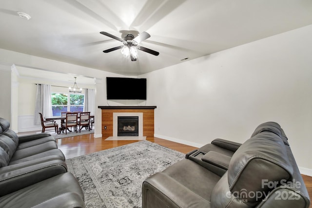 2117 Seabrook Ln, Fort Mill, SC 29715 - living room with a ceiling fan, wood finished floors, a chandelier, and baseboards