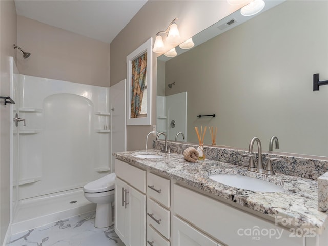 41 Wheeler Rd, Weaverville, NC 28787 - full bathroom featuring a shower, double vanity, toilet, and marble finish flooring