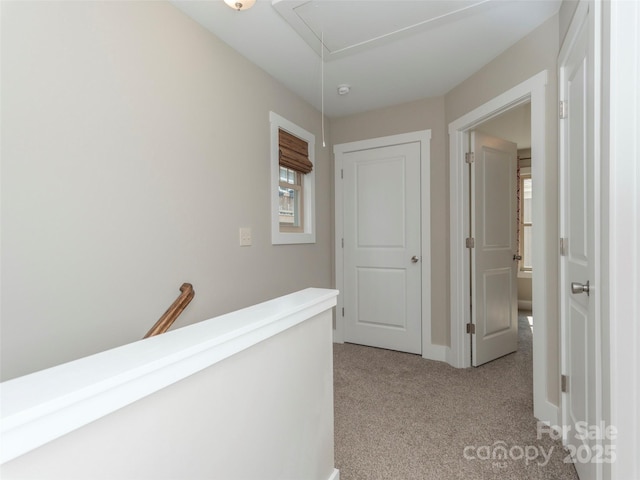 41 Wheeler Rd, Weaverville, NC 28787 - hall with light colored carpet, attic access, and an upstairs landing